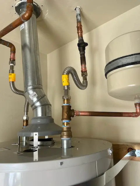 Water heater installation and plumbing repair in Bedford Four Corners